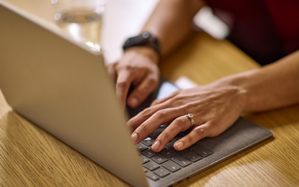 Laptop with hands